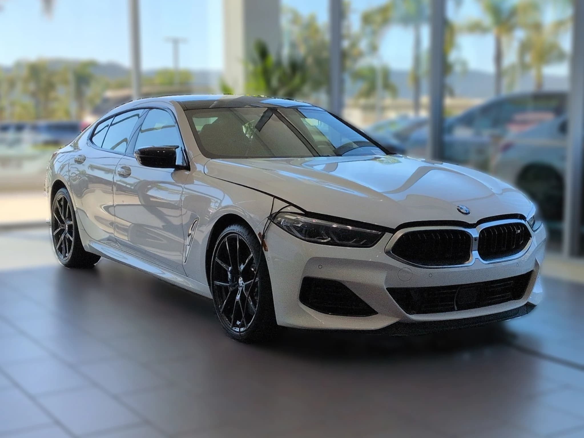 BMW 8 Series M850i Gran Coupe 2026 — side view