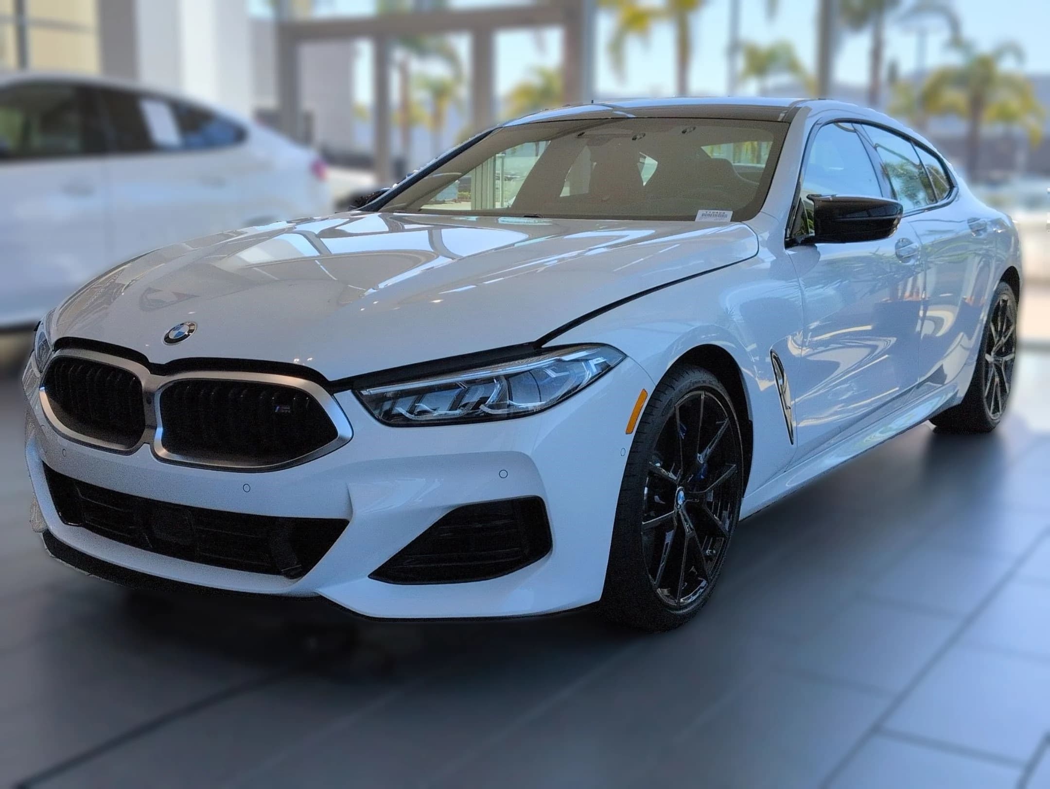 BMW 8 Series M850i Gran Coupe 2026 — side view