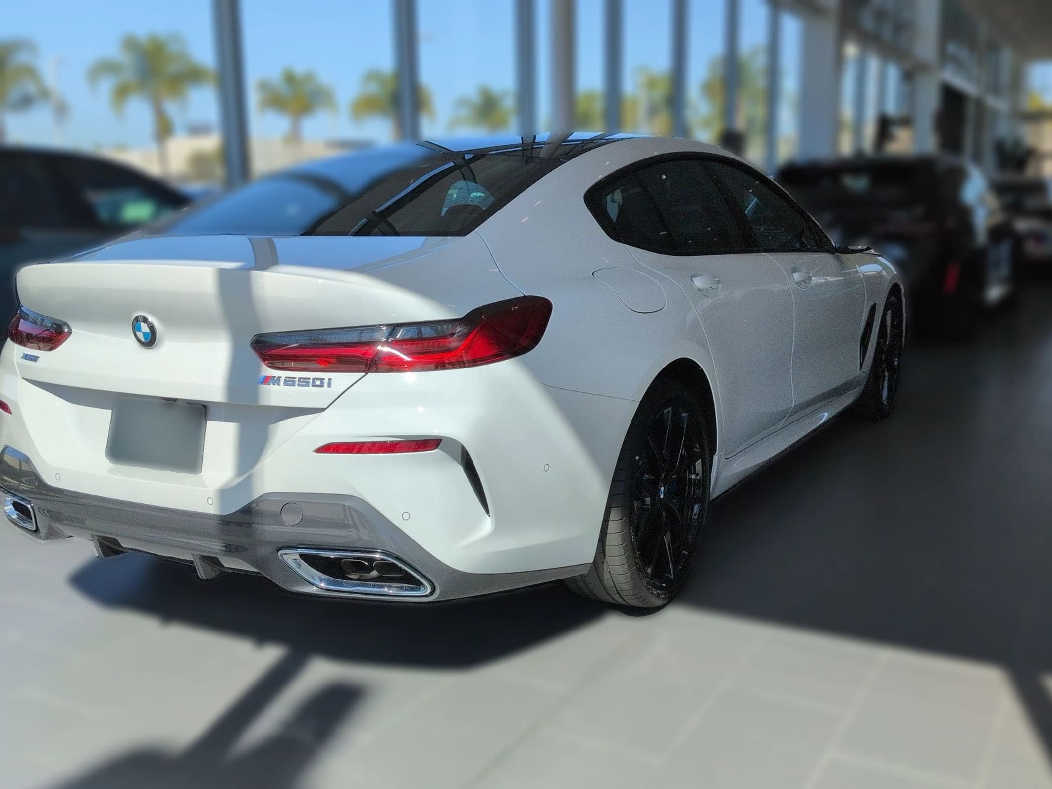BMW 8 Series M850i Gran Coupe 2026 — side view