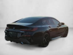 BMW 8 Series M850i Gran Coupe 2026 — side view