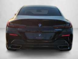 BMW 8 Series M850i Gran Coupe 2026 — side view