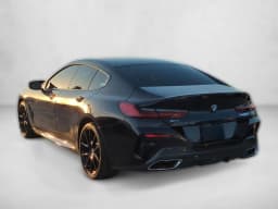 BMW 8 Series M850i Gran Coupe 2026 — side view
