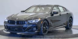 BMW 8 Series M850i Gran Coupe 2026 — side view
