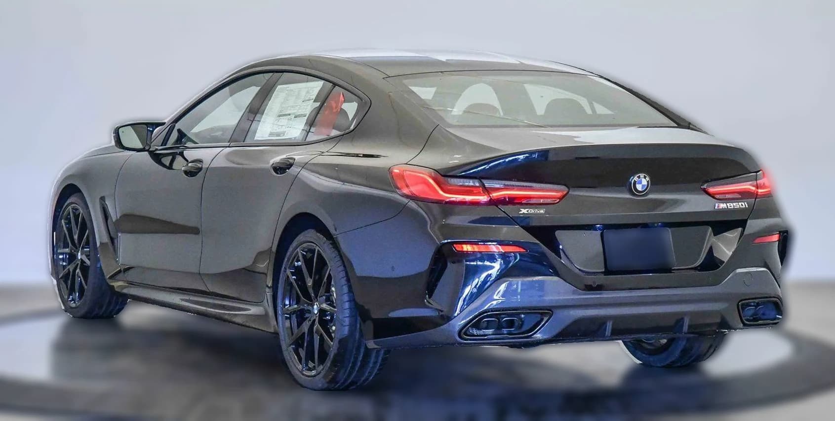 BMW 8 Series M850i Gran Coupe 2026 — side view