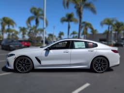 BMW 8 Series M850i Gran Coupe 2026 — side view