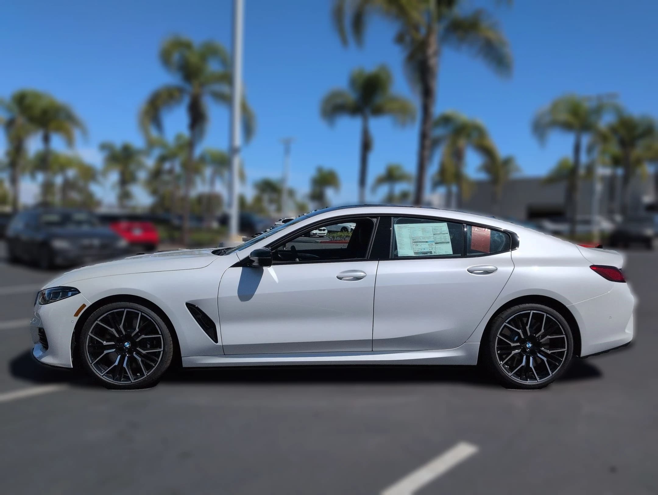 BMW 8 Series M850i Gran Coupe 2026 — side view