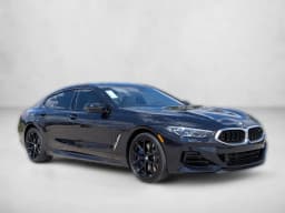 BMW 8 Series M850i Gran Coupe 2026 — side view