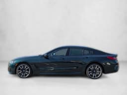 BMW 8 Series M850i Gran Coupe 2026 — side view