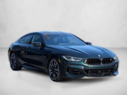 BMW 8 Series M850i Gran Coupe 2026 — side view