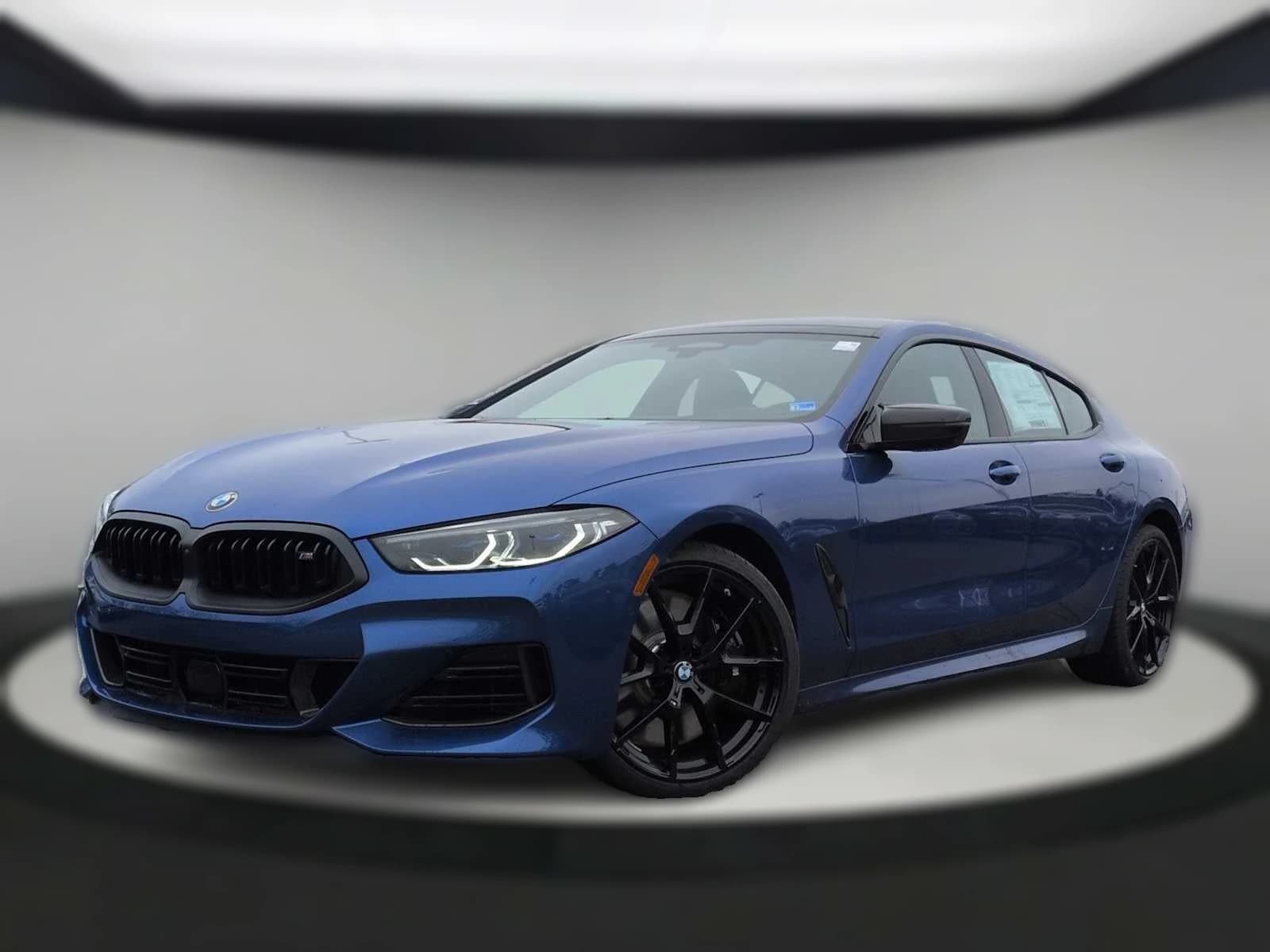 BMW 8 Series M850i Gran Coupe 2026 — side view