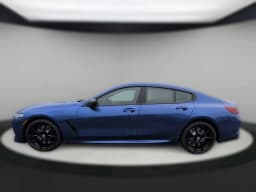 BMW 8 Series M850i Gran Coupe 2026 — side view