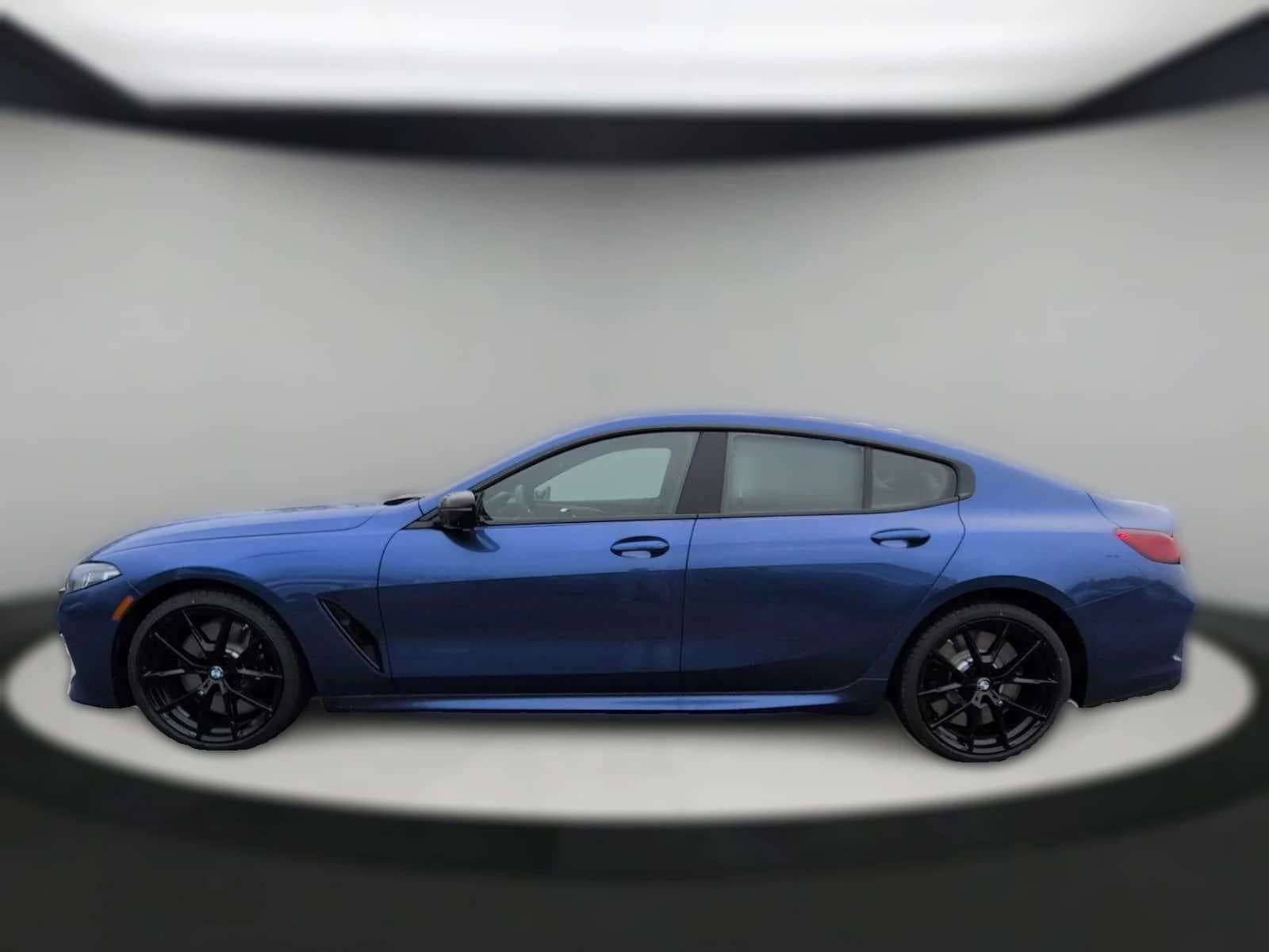 BMW 8 Series M850i Gran Coupe 2026 — side view