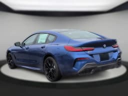BMW 8 Series M850i Gran Coupe 2026 — side view