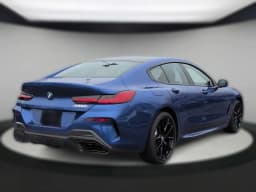 BMW 8 Series M850i Gran Coupe 2026 — side view