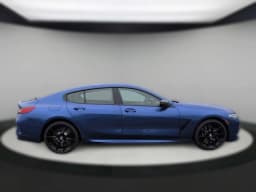 BMW 8 Series M850i Gran Coupe 2026 — side view