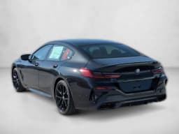 BMW 8 Series M850i Gran Coupe 2026 — side view