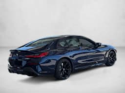 BMW 8 Series M850i Gran Coupe 2026 — side view