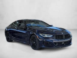 BMW 8 Series M850i Gran Coupe 2026 — side view