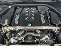 BMW 8 Series M850i Gran Coupe 2026 — side view