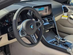 BMW 8 Series M850i Gran Coupe 2026 — side view