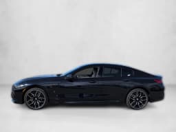 BMW 8 Series M850i Gran Coupe 2026 — side view