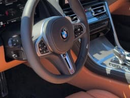 BMW 8 Series M850i Gran Coupe 2026 — side view