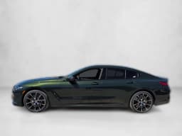 BMW 8 Series M850i Gran Coupe 2026 — side view