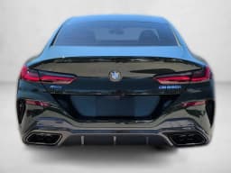BMW 8 Series M850i Gran Coupe 2026 — side view