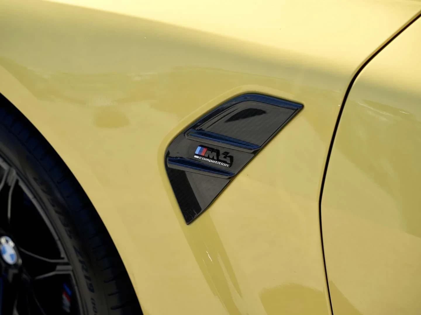 BMW M4 Competition Coupe 2026 — side view