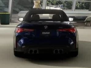 BMW M4 Competition xDrive Convertible 2027 — side view
