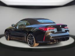 BMW M4 Competition xDrive Convertible 2027 — side view