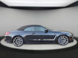 BMW M4 Competition xDrive Convertible 2027 — side view