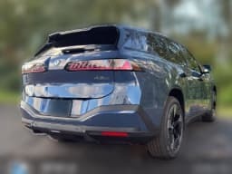 BMW iX3 50 xDrive Sports Activity Vehicle 2027 — side view