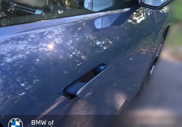 BMW iX3 50 xDrive Sports Activity Vehicle 2027 — side view