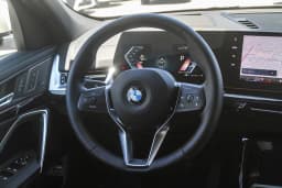 BMW X2 xDrive28i Sports Activity Coupe 2026 — side view