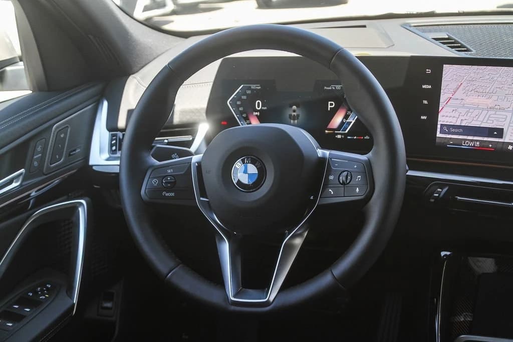 BMW X2 xDrive28i Sports Activity Coupe 2026 — side view