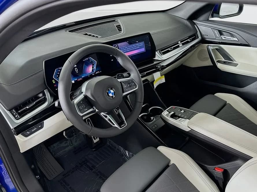 BMW X2 xDrive28i Sports Activity Coupe 2026 — side view