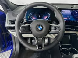 BMW X2 xDrive28i Sports Activity Coupe 2026 — side view