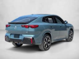 BMW X2 xDrive28i Sports Activity Coupe 2026 — side view