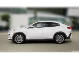 BMW X2 xDrive28i Sports Activity Coupe 2026 — side view