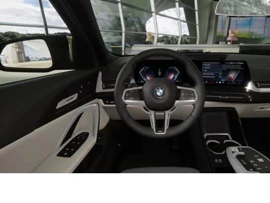 BMW X2 xDrive28i Sports Activity Coupe 2026 — side view