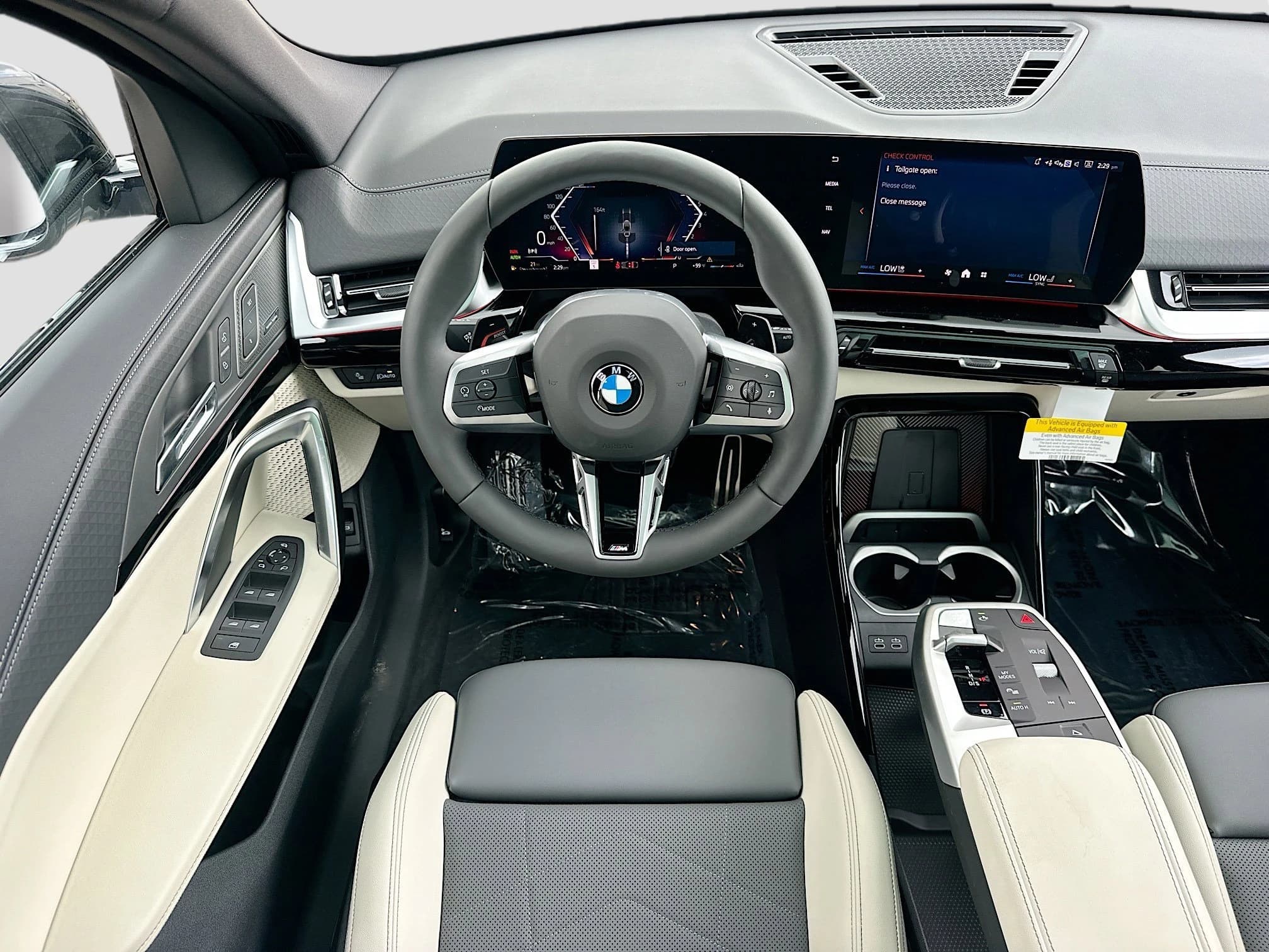 BMW X2 xDrive28i Sports Activity Coupe 2026 — side view