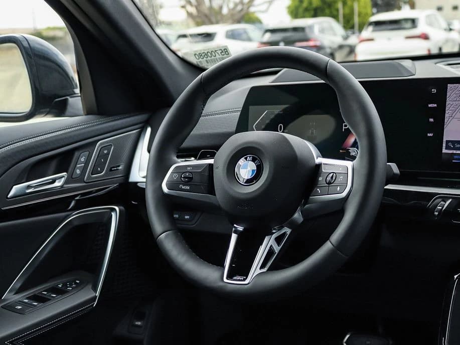 BMW X2 xDrive28i Sports Activity Coupe 2026 — side view