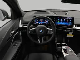 BMW X2 xDrive28i Sports Activity Coupe 2026 — side view