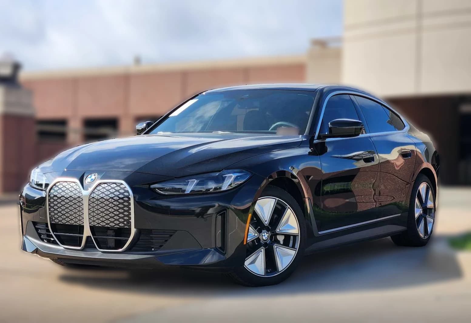 BMW i4 xDrive40 Gran Coupe 2026 — side view
