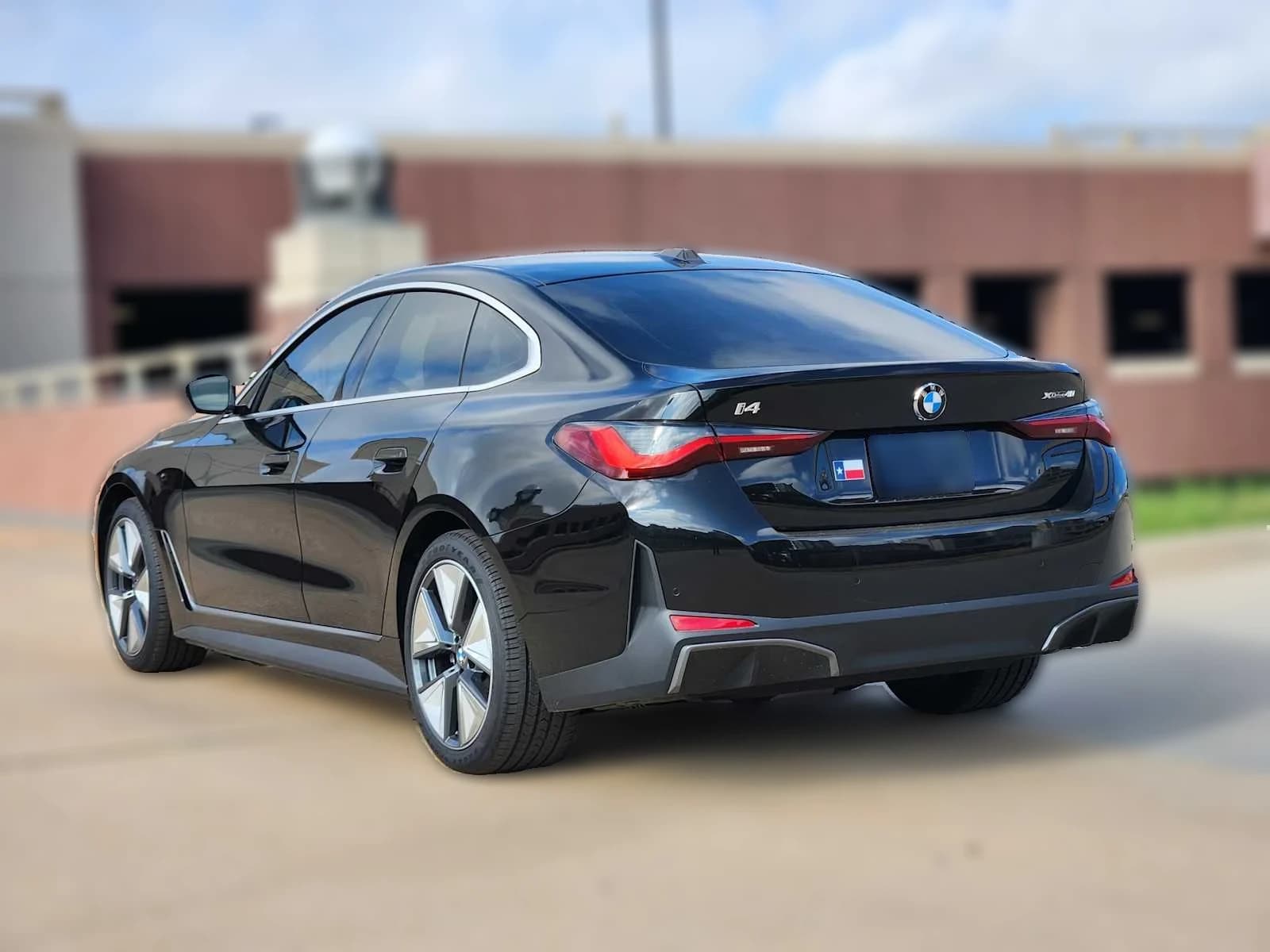 BMW i4 xDrive40 Gran Coupe 2026 — side view