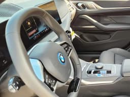 BMW i4 xDrive40 Gran Coupe 2026 — side view