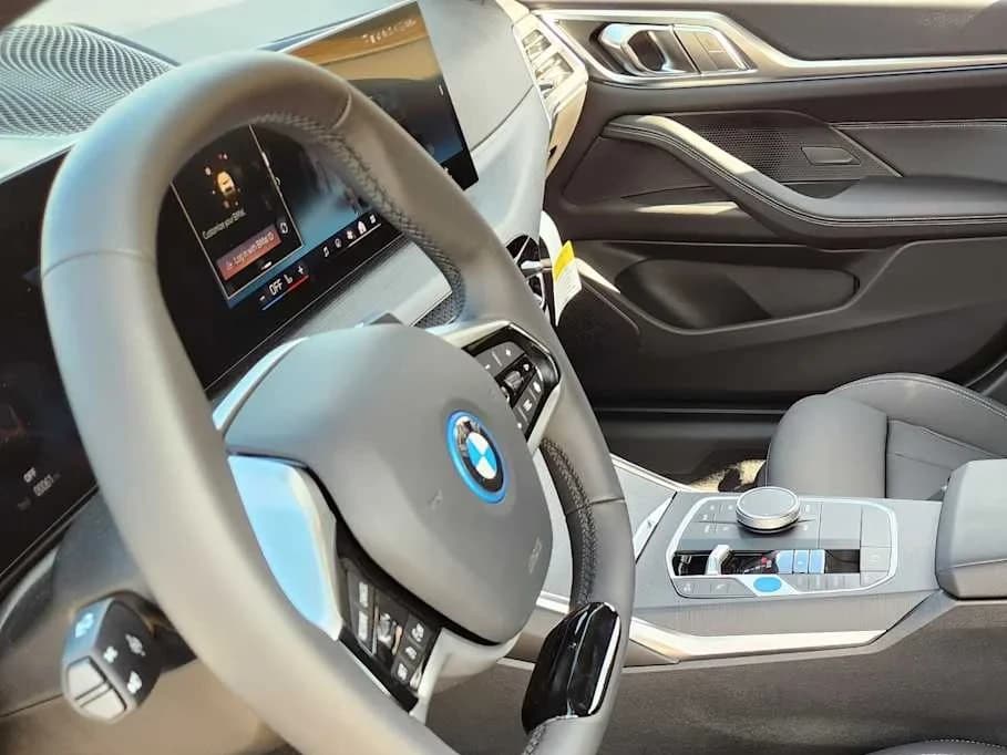BMW i4 xDrive40 Gran Coupe 2026 — side view