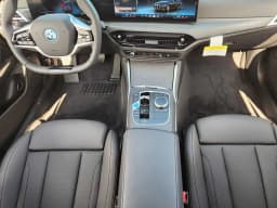BMW i4 xDrive40 Gran Coupe 2026 — side view