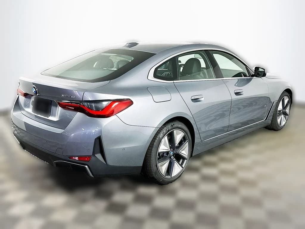 BMW i4 xDrive40 Gran Coupe 2026 — side view